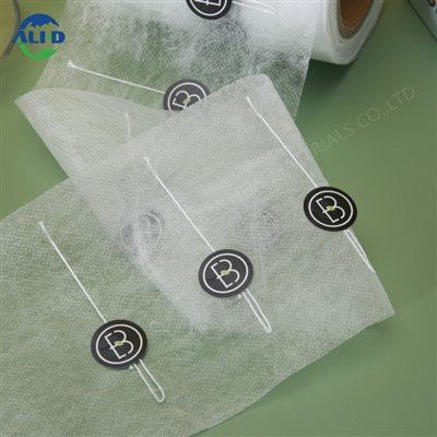 Makanan   Kelas   PLA   Non   Anyaman   Kain   Gulung   dengan   Label   dan   Benang   untuk   Kopi   dan   Teh   Tas